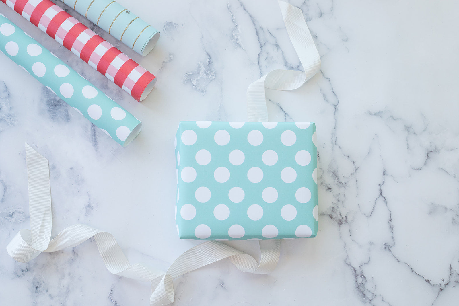 aqua blue polka dot gift wrap